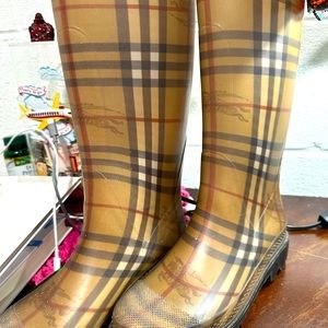 Burberry brown rain boots.
